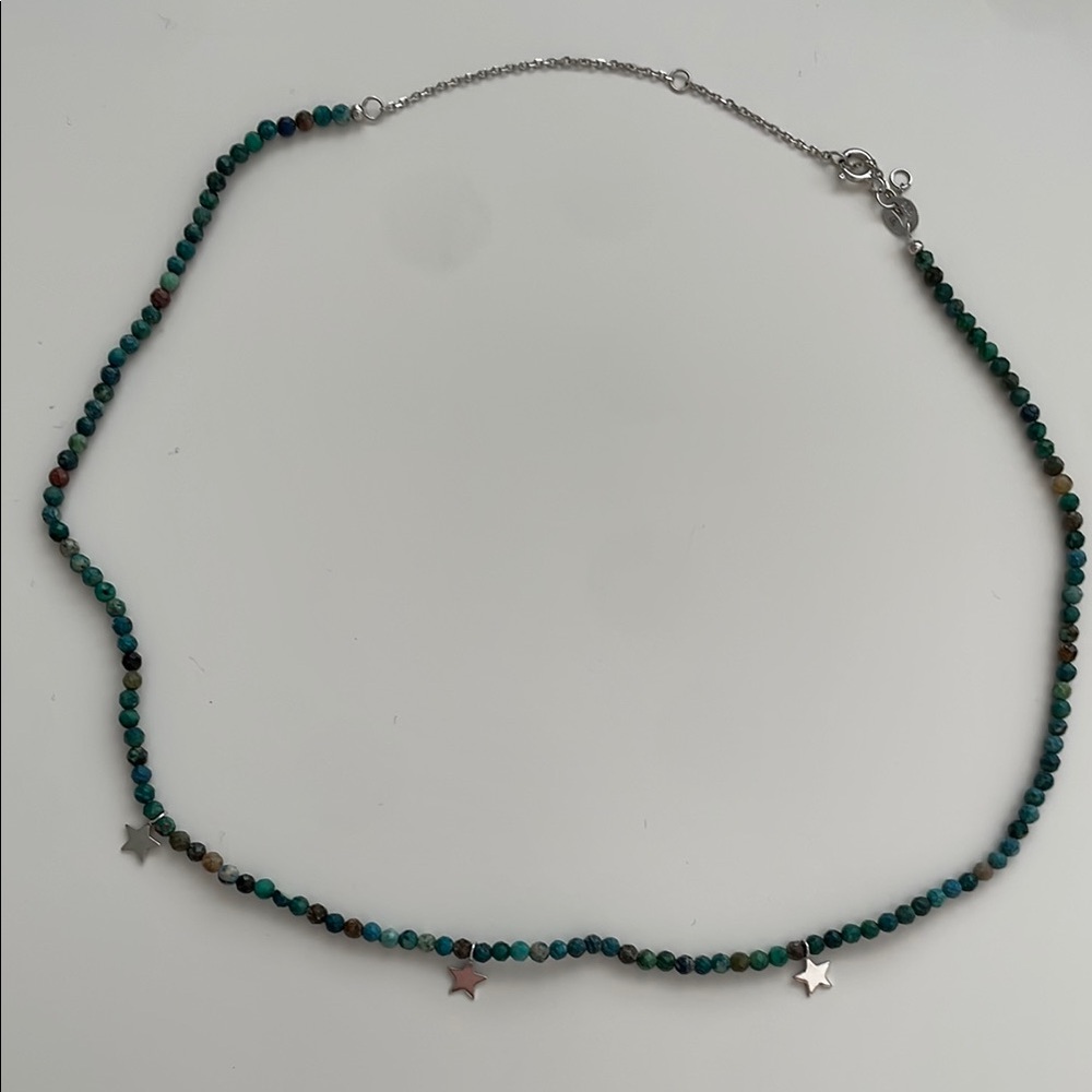 Elegant Beaded Necklace with Star Charms